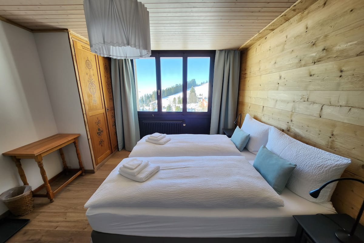 Premium bedding, desk, laptop workspace, WiFi (free)