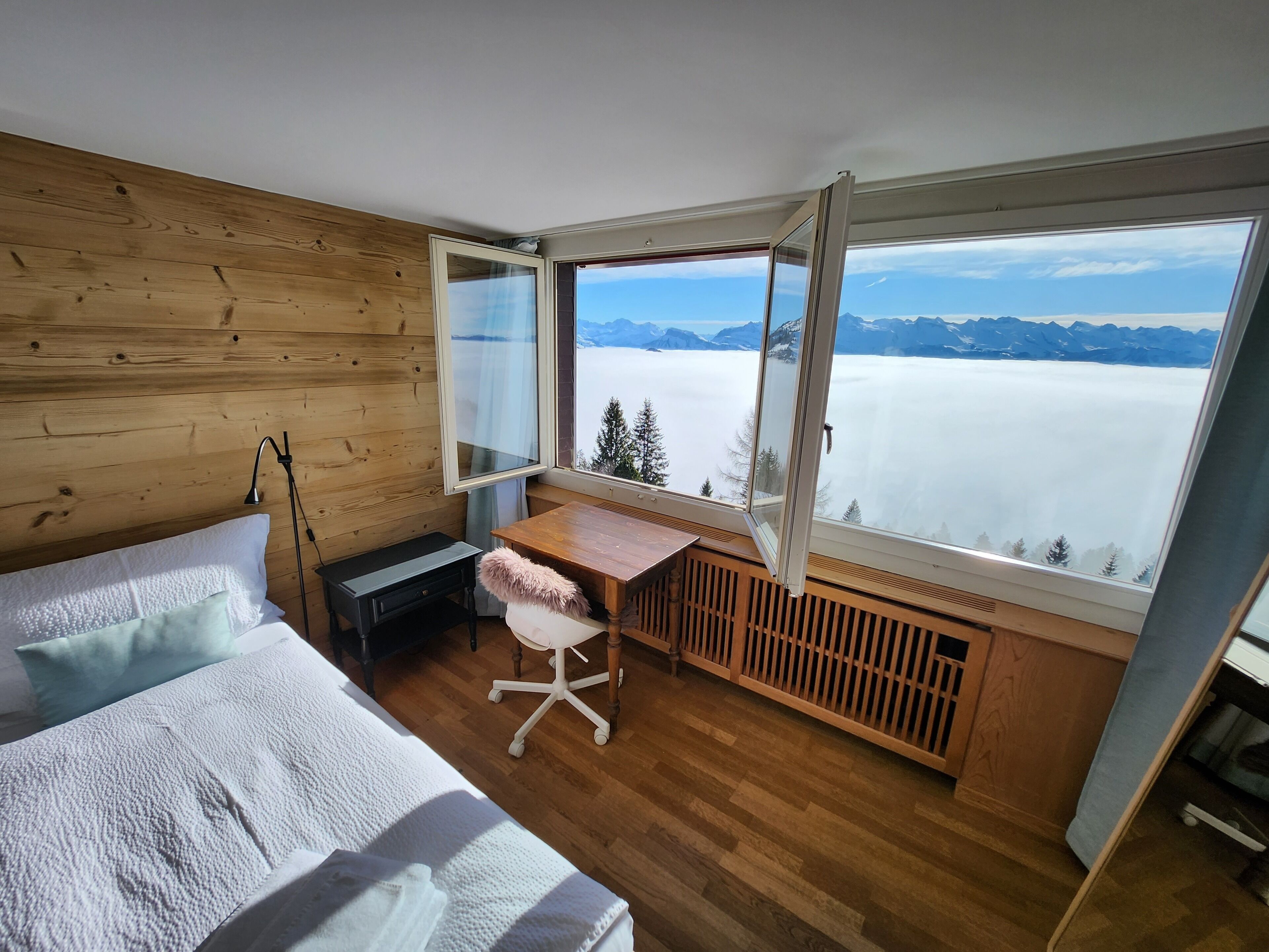 Premium bedding, desk, laptop workspace, free WiFi