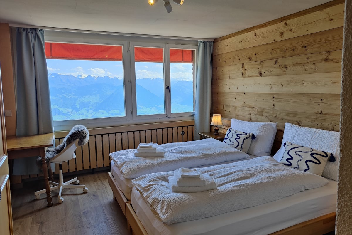 Premium bedding, desk, laptop workspace, WiFi (free)