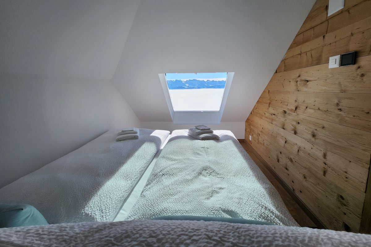 Premium bedding, desk, laptop workspace, WiFi (free)