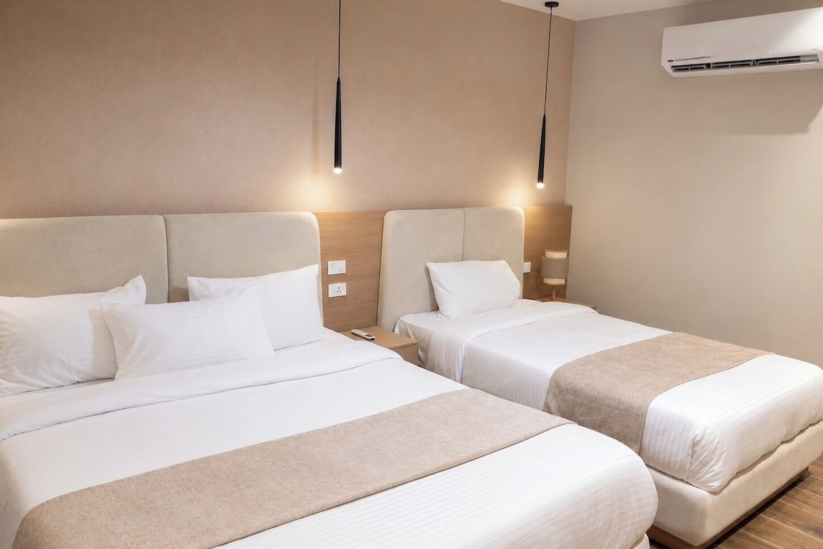Habitación Premium con 2 camas individuales, vistas a la ciudad | Colchones viscoelásticos, minibar, cortinas opacas