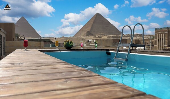 Outdoor pool, open 9:00 AM to 6:00 PM, lifeguards on site - Pyramids Height Hotel & Pyramids Master Scene Rooftop (Giza)