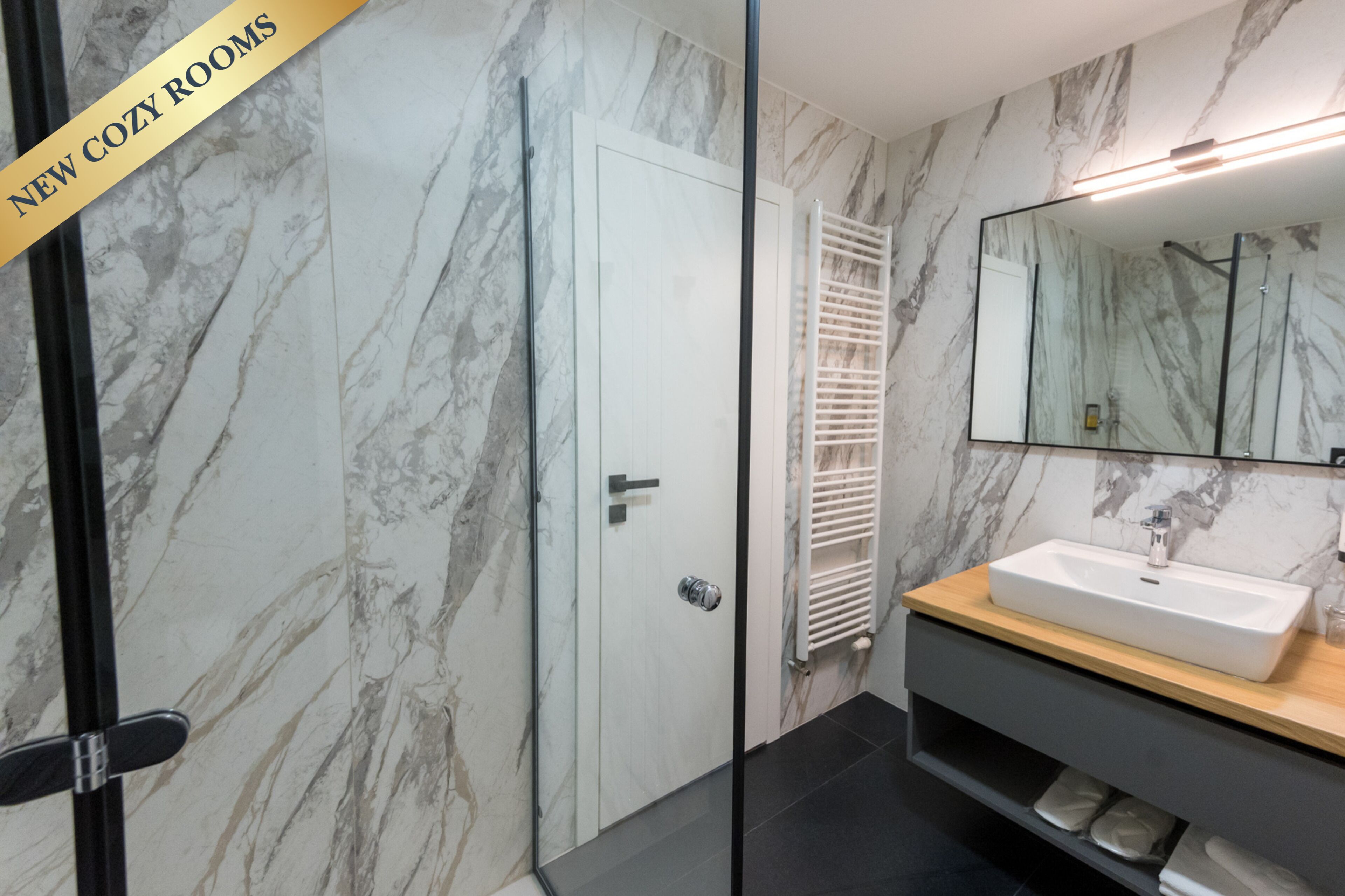 junior suite, 1 king bed with sofa bed | bathroom | shower, free toiletries, hair dryer, bathrobes