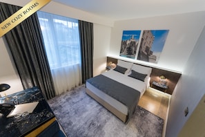 Superior tweepersoonskamer, 1 kingsize bed | Een minibar, een kluis op de kamer, verduisterende gordijnen