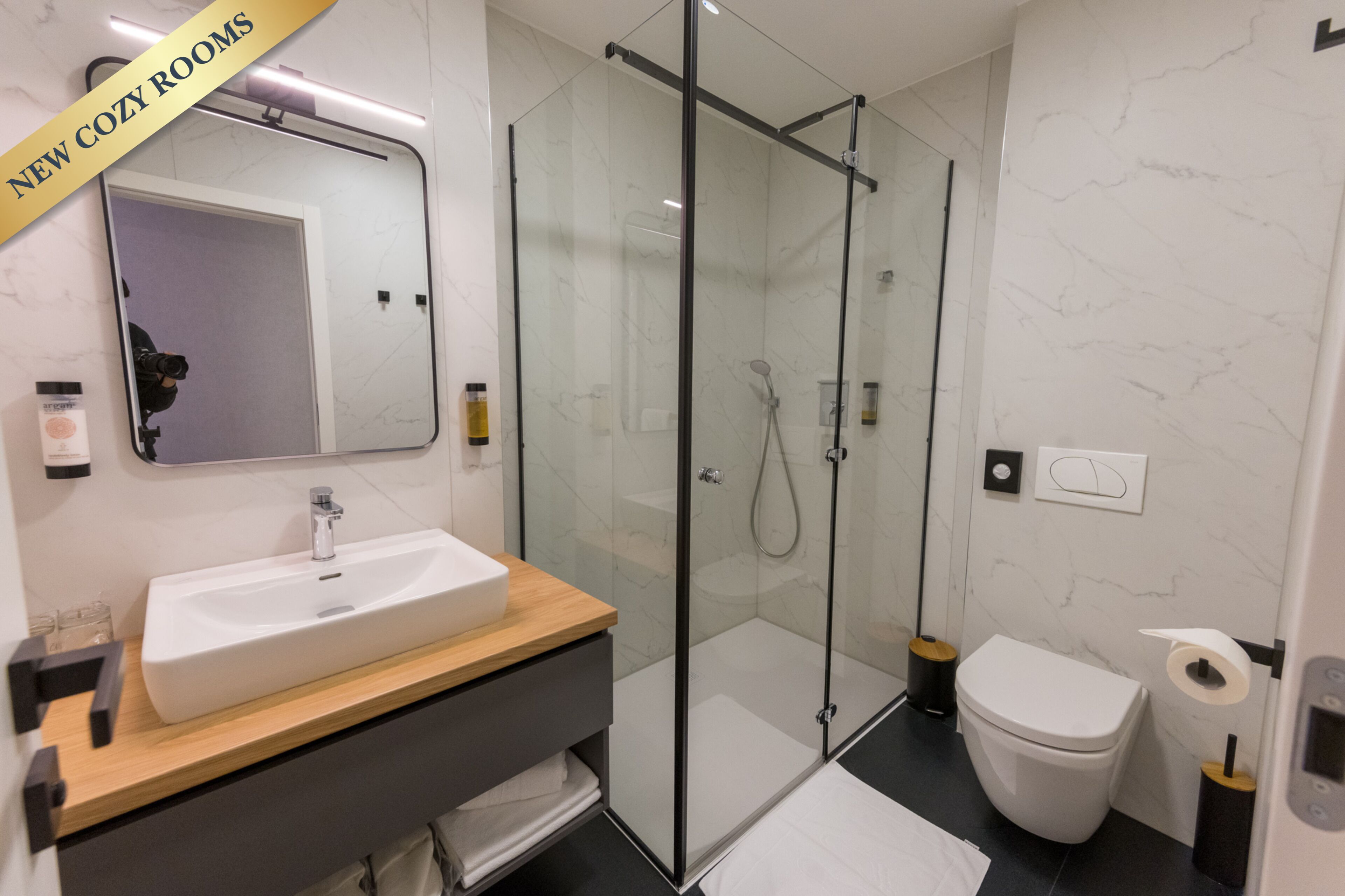 comfort twin room, 2 queen beds | bathroom | shower, free toiletries, hair dryer, bathrobes