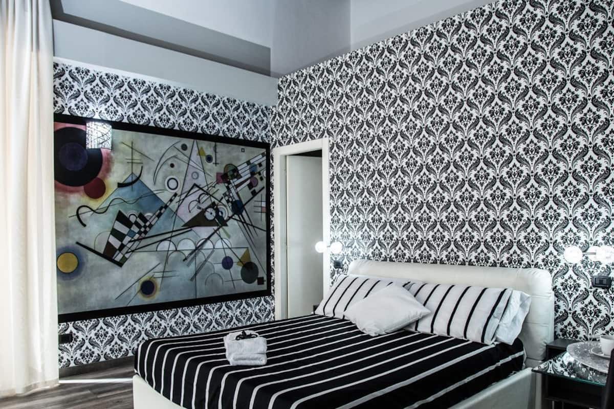 Classic Triple Room, Balcony (Kandinsky) | Minibar, individually decorated, desk, blackout drapes