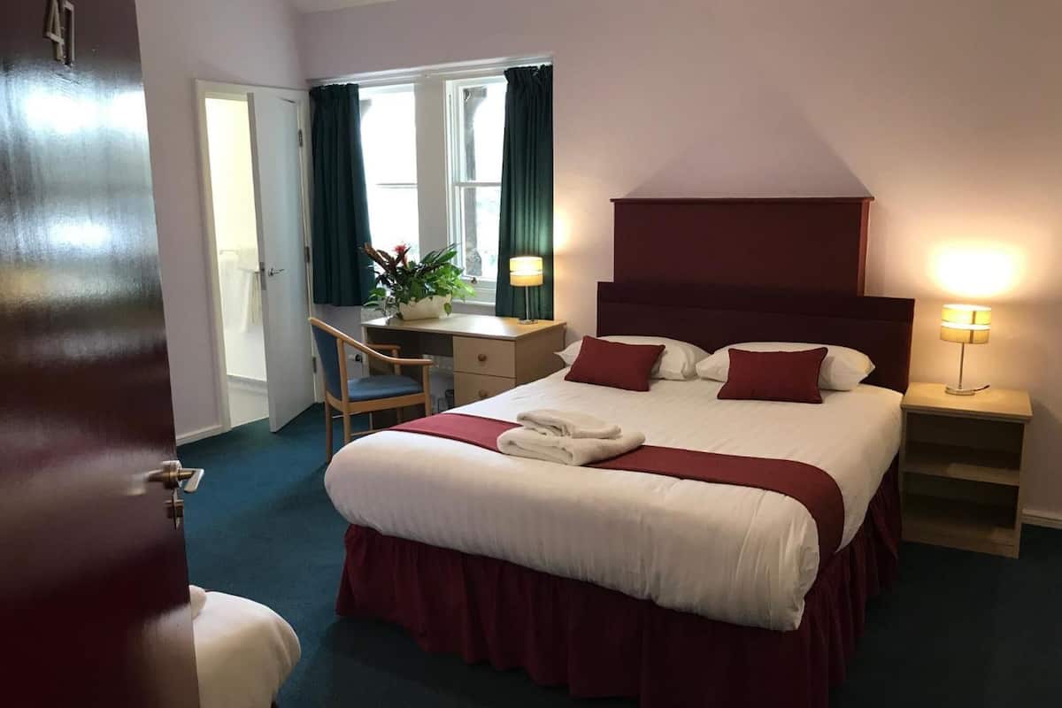 family triple room, multiple beds, garden view | desk, iron/ironing board, free wifi, bed sheets