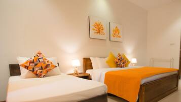 Kamar Triple Deluks, Beberapa Tempat Tidur | Seprai katun Mesir, seprai premium, dan selimut bulu angsa