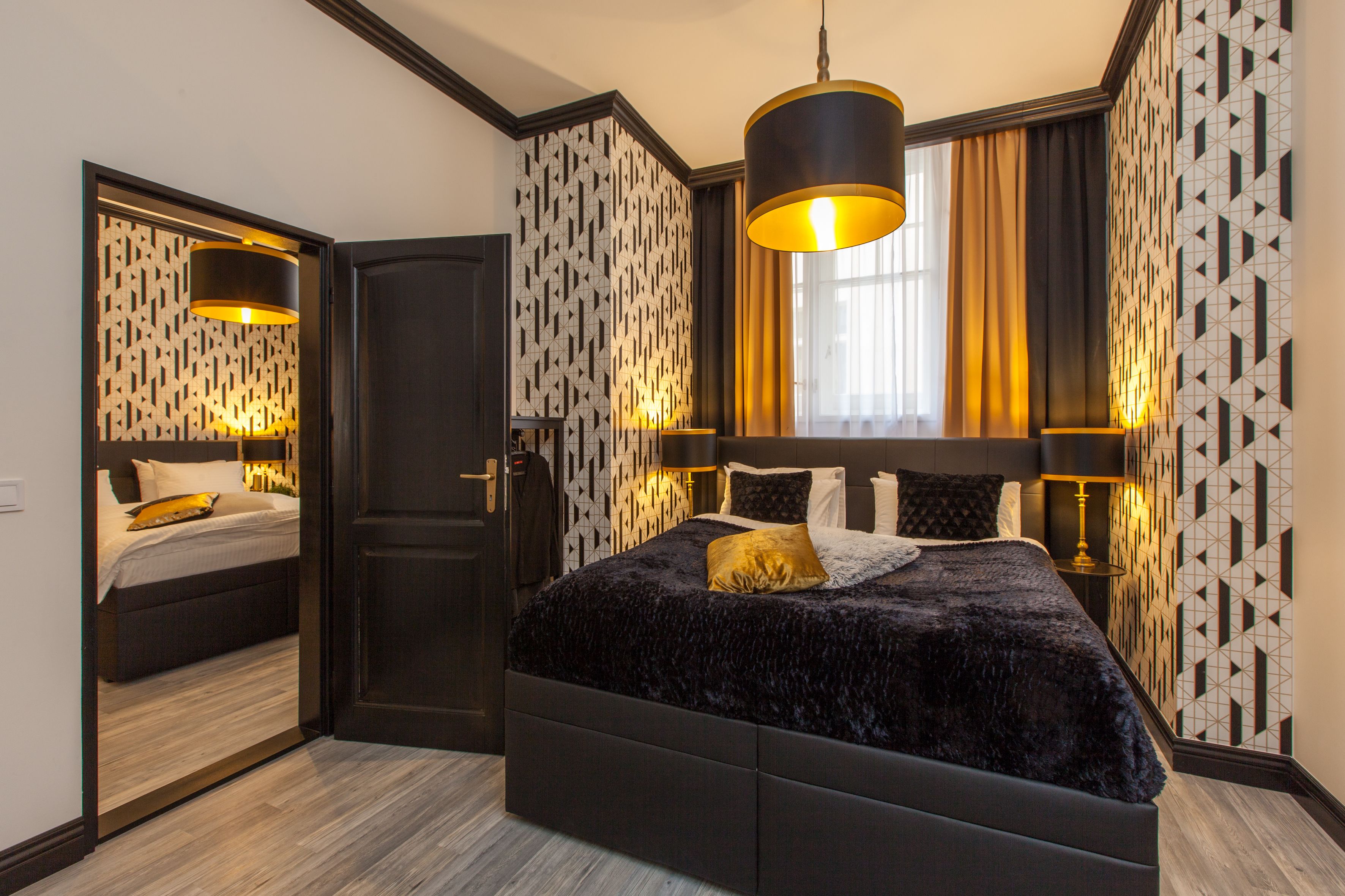 deluxe quadruple room (family) | in-room safe, blackout curtains, iron/ironing board, free wifi