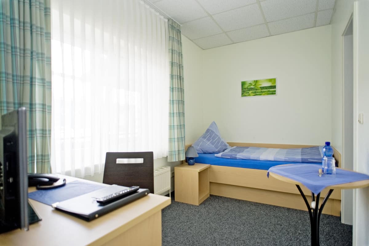 Desk, cribs (free), rollaway beds (surcharge), WiFi (free)