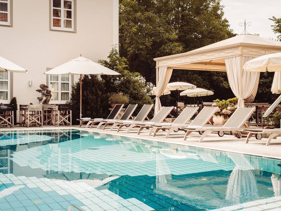 Indoor pool, outdoor pool, open 7:00 AM to 10:00 PM, pool umbrellas