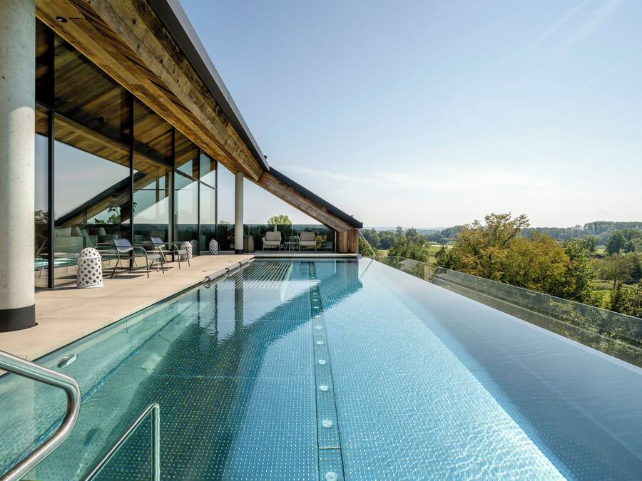 Indoor pool, outdoor pool, open 7:00 AM to 10:00 PM, pool umbrellas