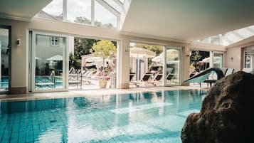 Indoor pool, outdoor pool, open 7:00 AM to 10:00 PM, pool umbrellas