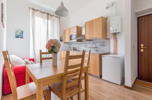 Apartment, 1 Bedroom | Living area | Flat-screen TV