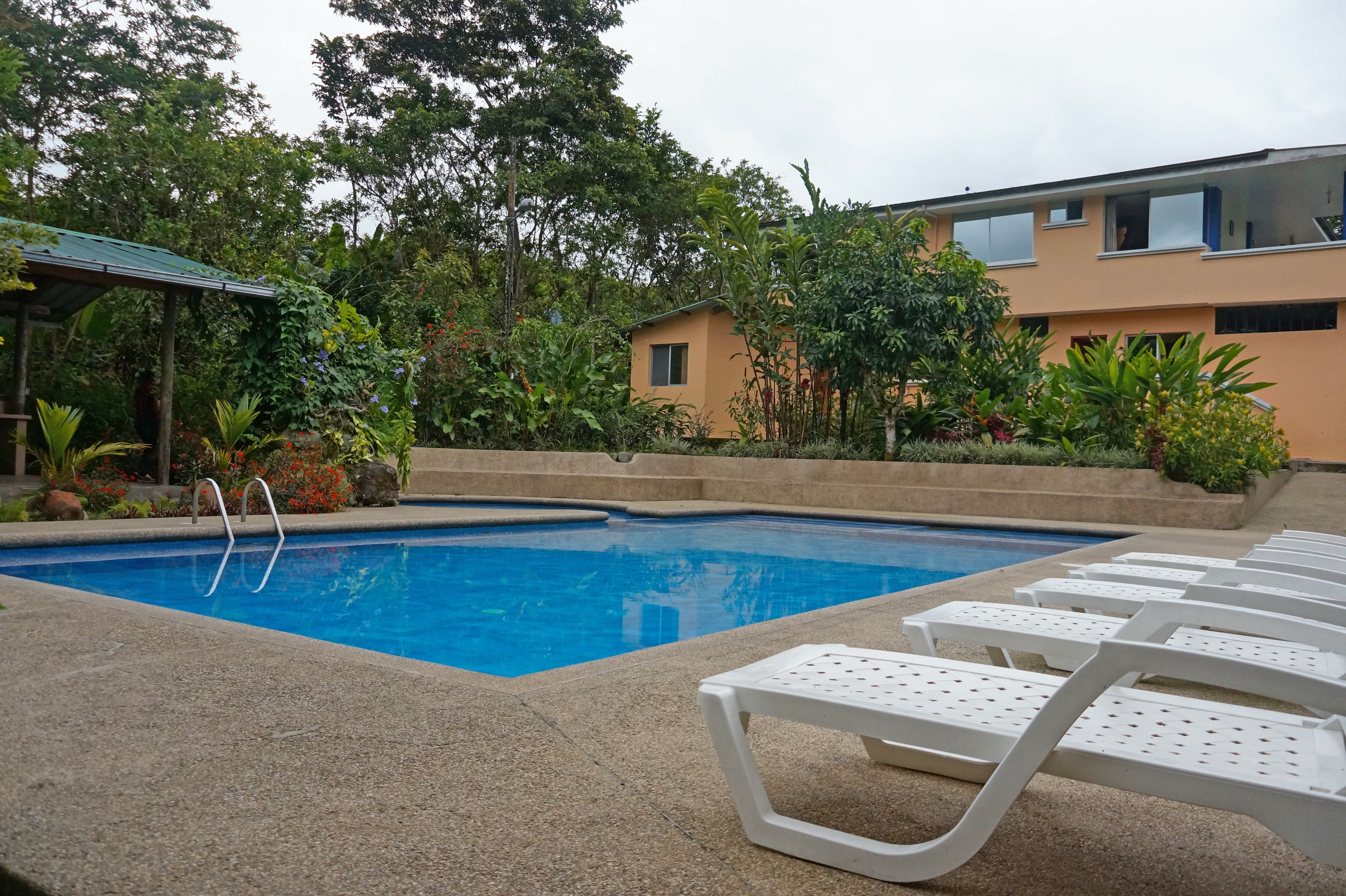 outdoor pool, open 9:00 am to 9:00 pm, pool umbrellas, pool loungers