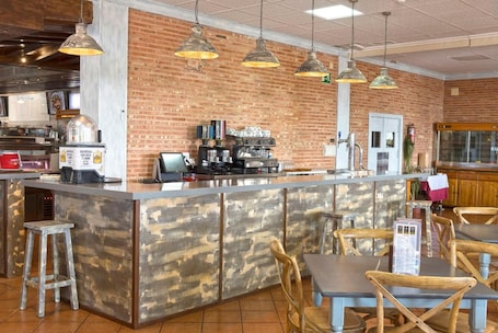 Breakfast, lunch, dinner served; local cuisine