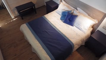 Basic Double Room | Minibar, in-room safe, individually decorated, individually furnished