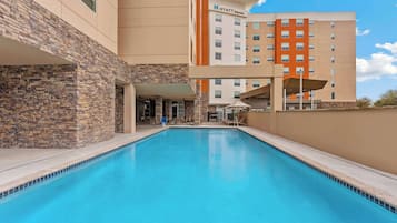 Outdoor pool, pool umbrellas, sun loungers