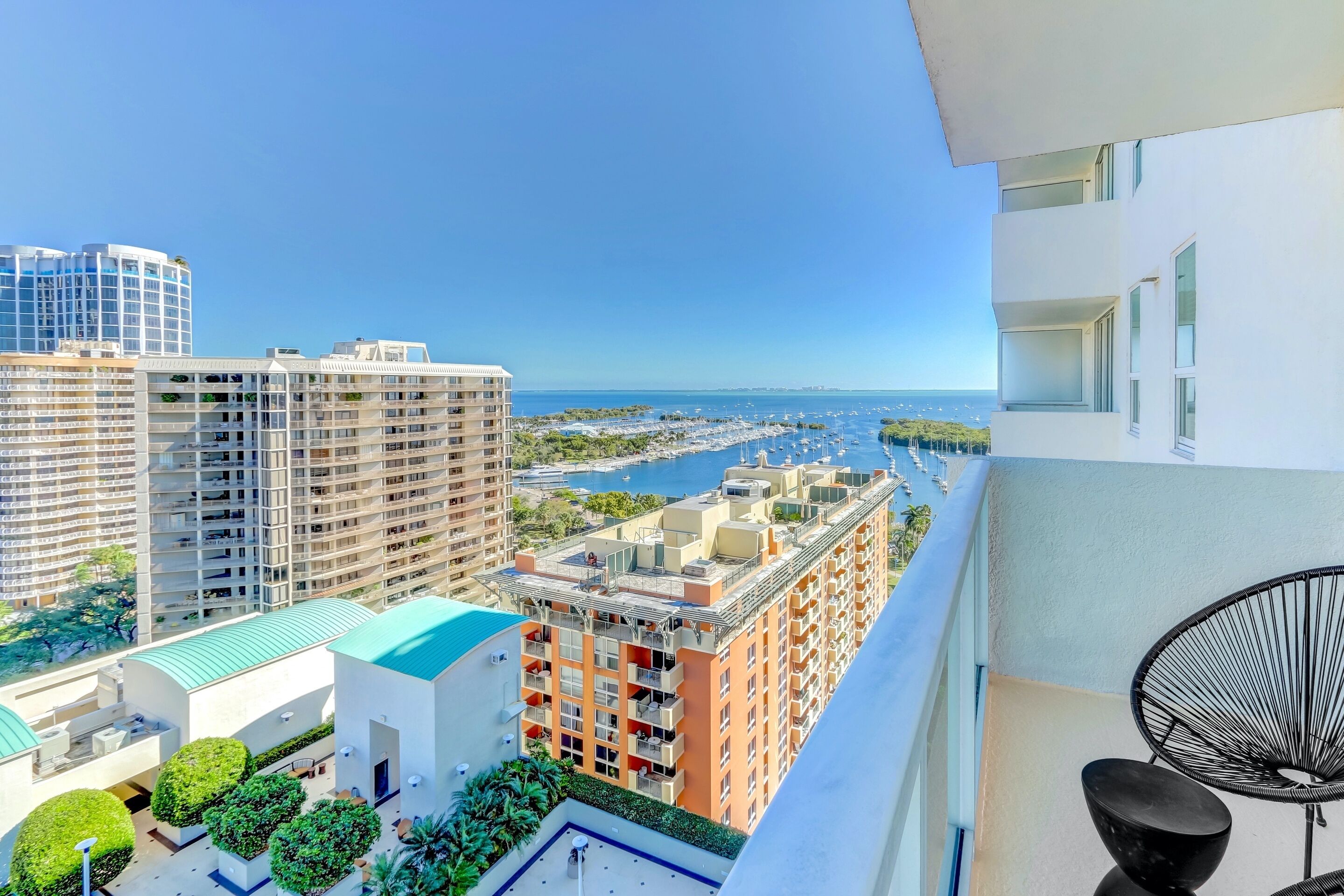 incredible city & partial bay view corner deluxe studio in coconut grove | balcony view