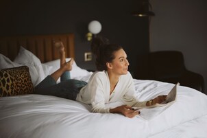 Premium bedding, down comforters, pillowtop beds, individually decorated