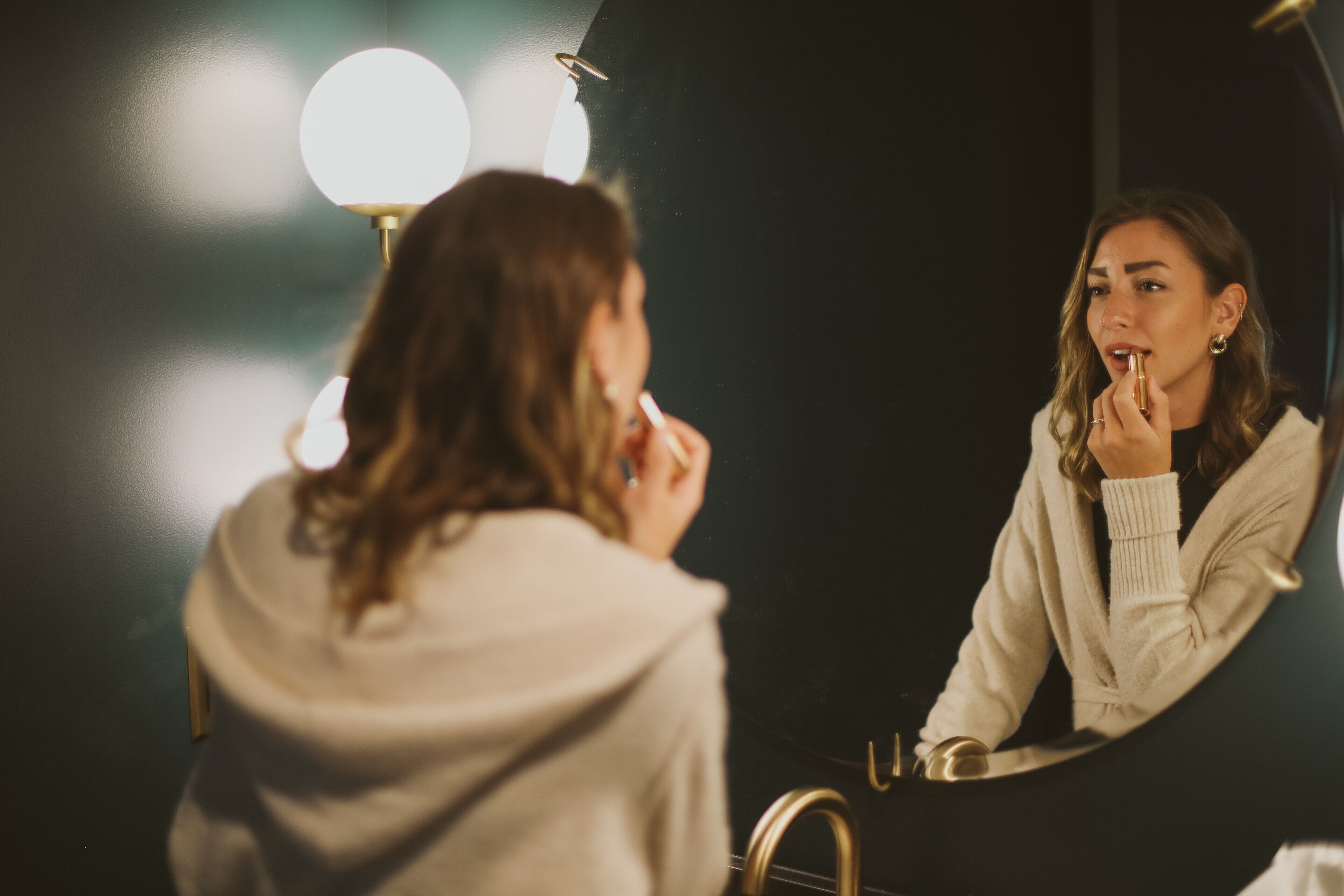 designer toiletries, hair dryer, towels