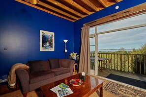 Panoramic House, 3 Bedrooms, Mountain View, Sea Facing | Living area | Flat-screen TV, DVD player, ping pong, toys - Cubby House Stay - Kaikoura (Hapuku)