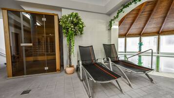 Relax in a stylish waiting area with easy access to the building and a view of the outdoors.