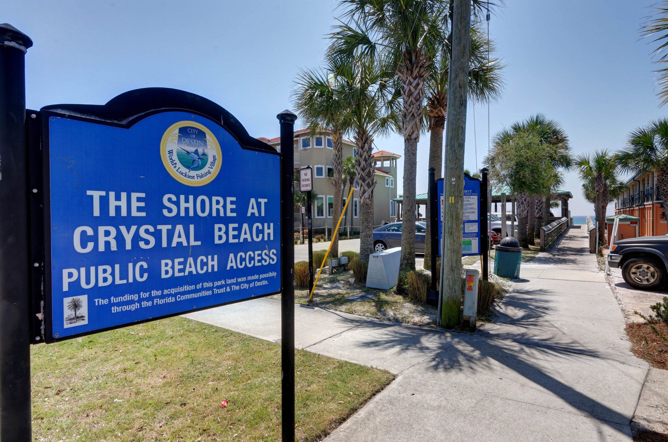 A sign for Crystal Beach Public Beach Access.