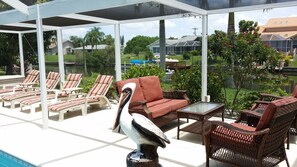 Terrace/patio - Adagio Villa. Heated pool, huge lanai, gulf canal, kayaks, bikes, 2 living rooms (Cape Coral)