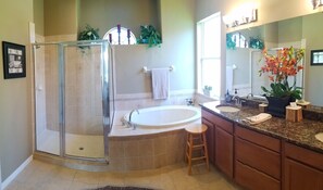 Combined shower/tub, hair dryer, towels, soap
