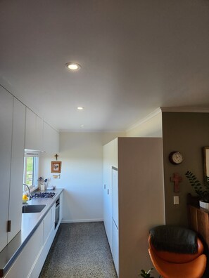 Full-size galley kitchen with  the equipment  needed to whip up a fabulous meal