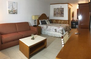 Habitación individual Premium, 1 cama Queen size y sofá cama | Ropa de cama de alta calidad y camas con pillow-top