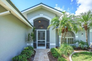 Exterior detail - La Florida, a spacious 3-bedroom home in SE Cape Coral with a serene freshwater canal view. (Cape Coral)