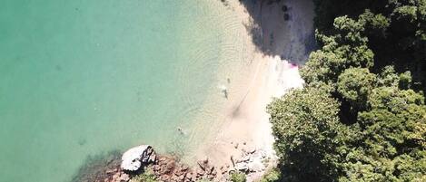 On the beach, sun loungers