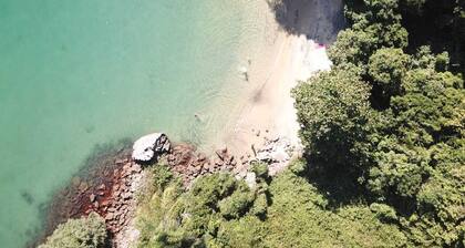 House on land with ocean, whales and turtle beaches kayaks and sailboat option