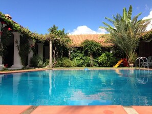 Outdoor pool, pool umbrellas, pool loungers