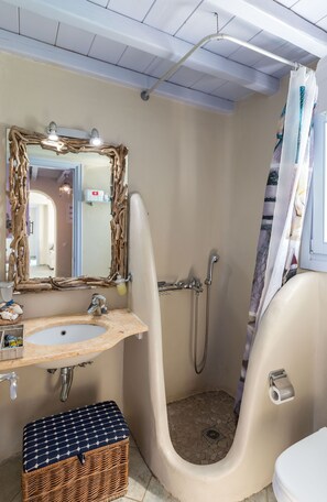 Combined shower/tub, hair dryer, towels, soap