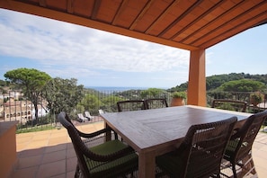 Partial view from the outdoor terrace, to the Mediterranean.