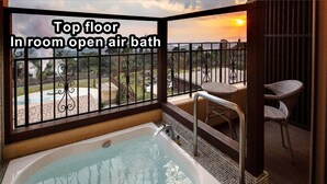 A top-floor room with an open-air balcony, a hot tub, and outdoor furniture. - LA VISTA Kirishima Hills (Kirishima)