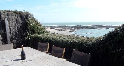 Seafront house with terrace on coastal path. 100 metres walk to beach