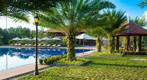 Outdoor pool, open 6:00 AM to 10:00 PM, free pool cabanas