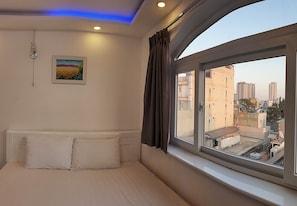 VIP Room, City View | Down comforters, minibar, desk, soundproofing
