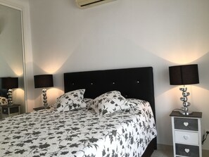 2 habitaciones, tabla de planchar con plancha y wifi gratis 