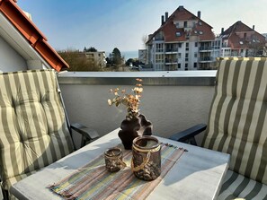 Outdoor dining - Penthouse apartment in a newly built house coast magic in Großenbrode (Großenbrode)
