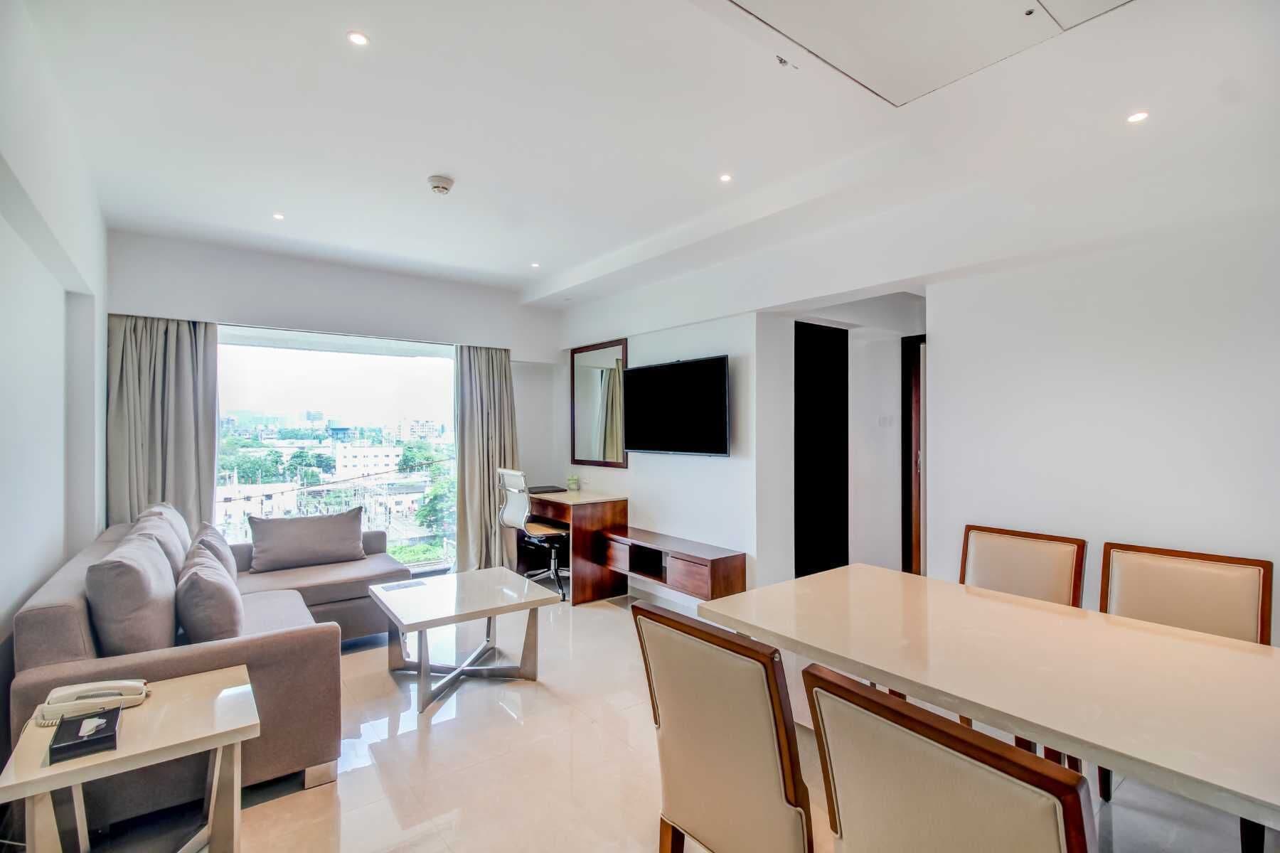 One Bedroom Residence | Living area | 32-inch LED TV with cable channels, TV