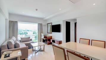 One Bedroom Residence | Living area | 32-inch LED TV with cable channels, TV