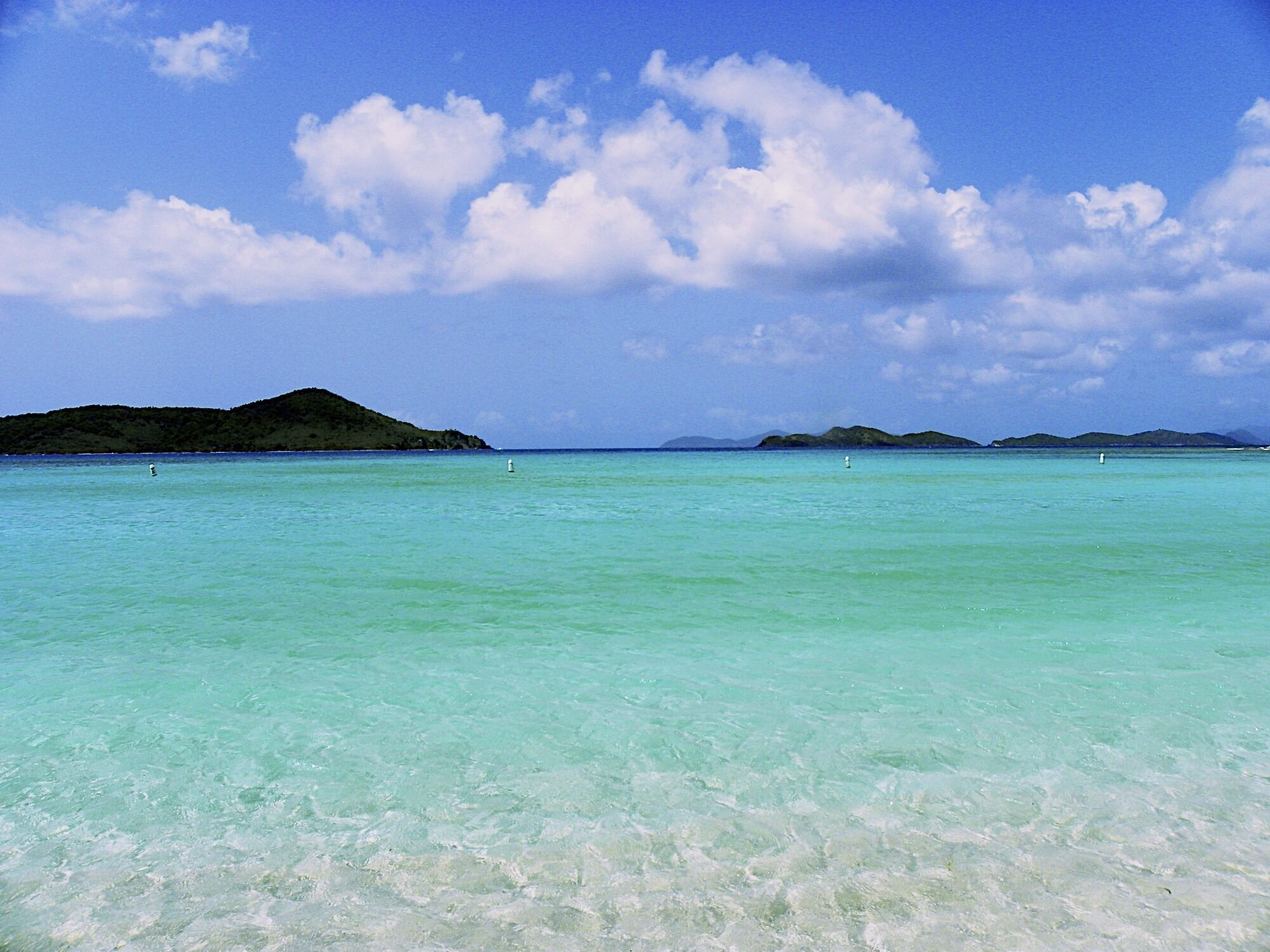 On the beach, sun loungers, beach towels