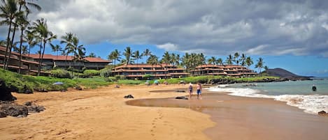On the beach, sun loungers, beach towels