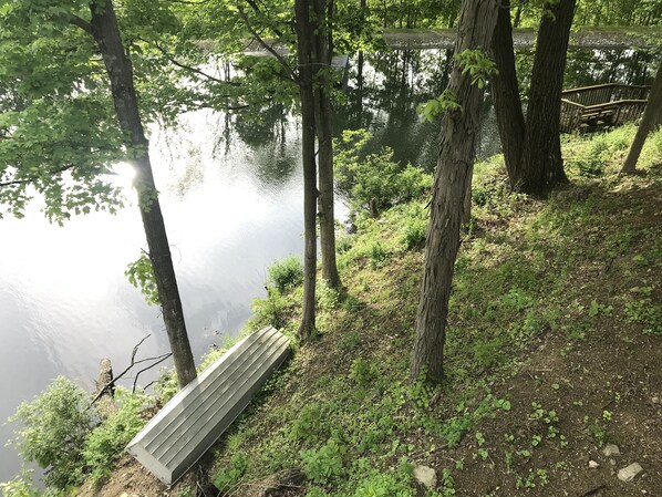 A wooden bench by a lake surrounded by trees. - Beautiful private property in rural environment overlooking Ski Liberty. (Fairfield)