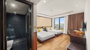 Suite Triple Room with Balcony | Premium bedding, down comforters, memory foam beds, minibar